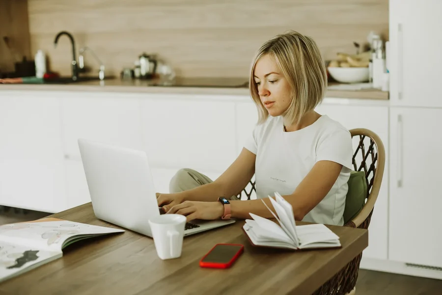 Woman working remotely from home for hybrid workplace